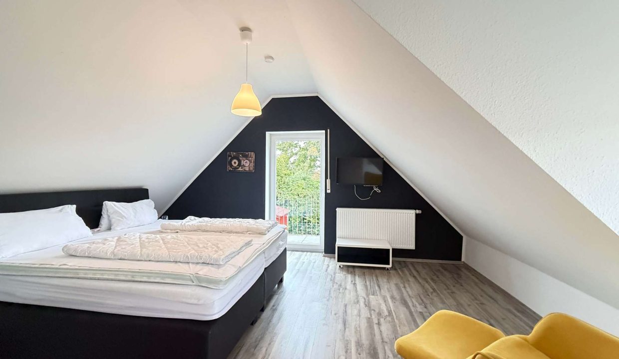 Schlafzimmer mit Balkon